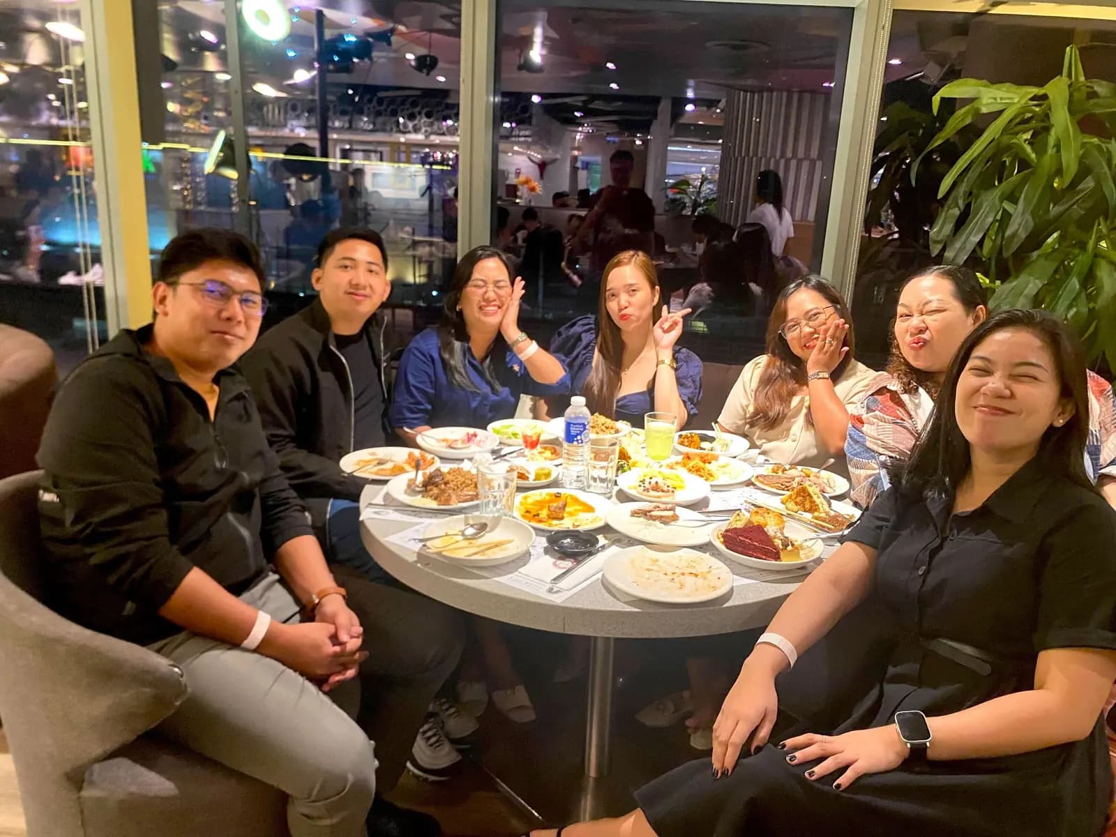 Teammates around a dinner table after the September 2025 quarterly get-together